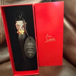 Christian Louboutin Rouge Lipstick with Gold Accents